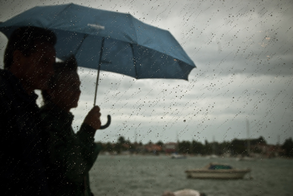 © aleksandra kokoza - rainy cafe view